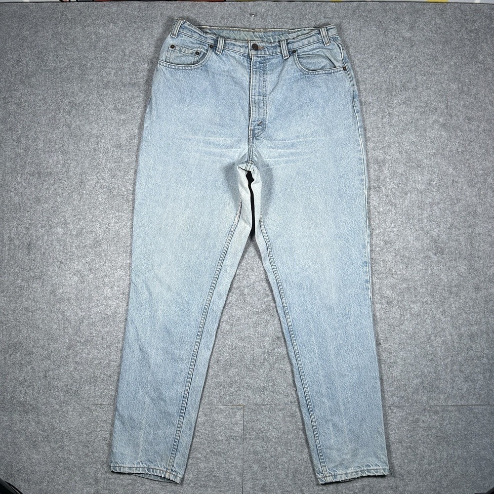 Vintage Levis 212 Denim Jeans Size 30x32 Blue Light‎ washed Slim Tapered Unisex